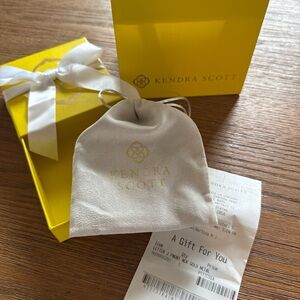 Kendra Scott Initial J Necklace with Yellow Gift Box and receipt.